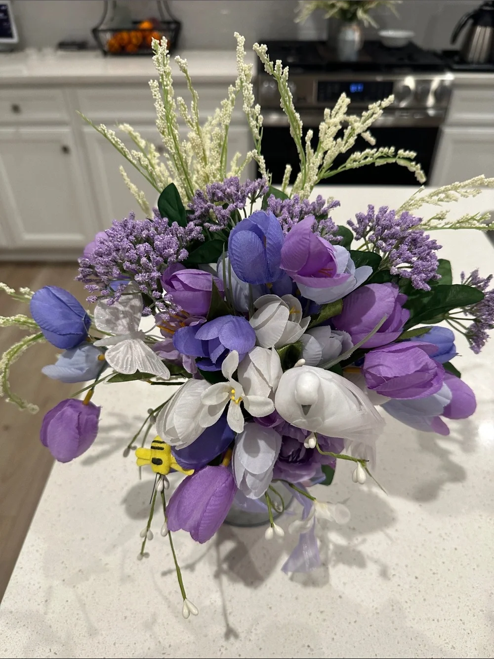 Artificial Purple and White Floral Arrangement with Decorative Bird